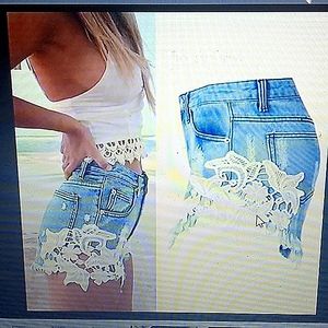 Indigo Rein floral trim sides high-rise shorts fringed